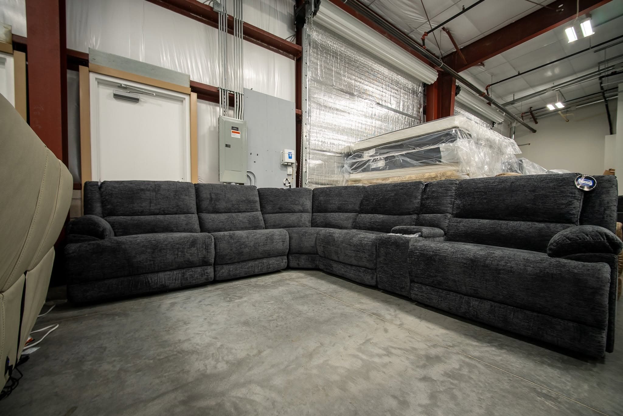 Dark Gray Reclining Sectional, In stock now at the BoxDrop Daytona Beach showroom on Fentress Blvd