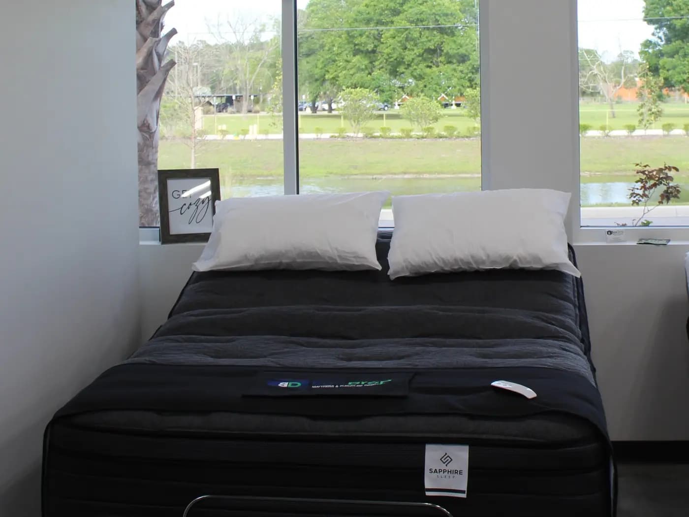 Adjustable bed base with the head raised, on display for BoxDrop Daytona Beach