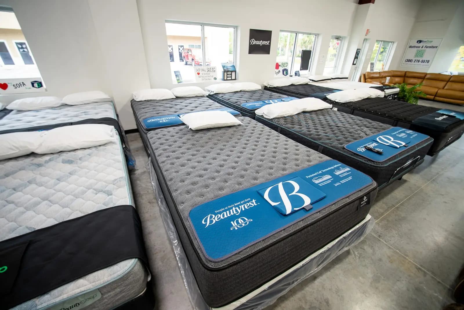 Rows of mattresses at BoxDrop Daytona Beach on Fentress Blvd